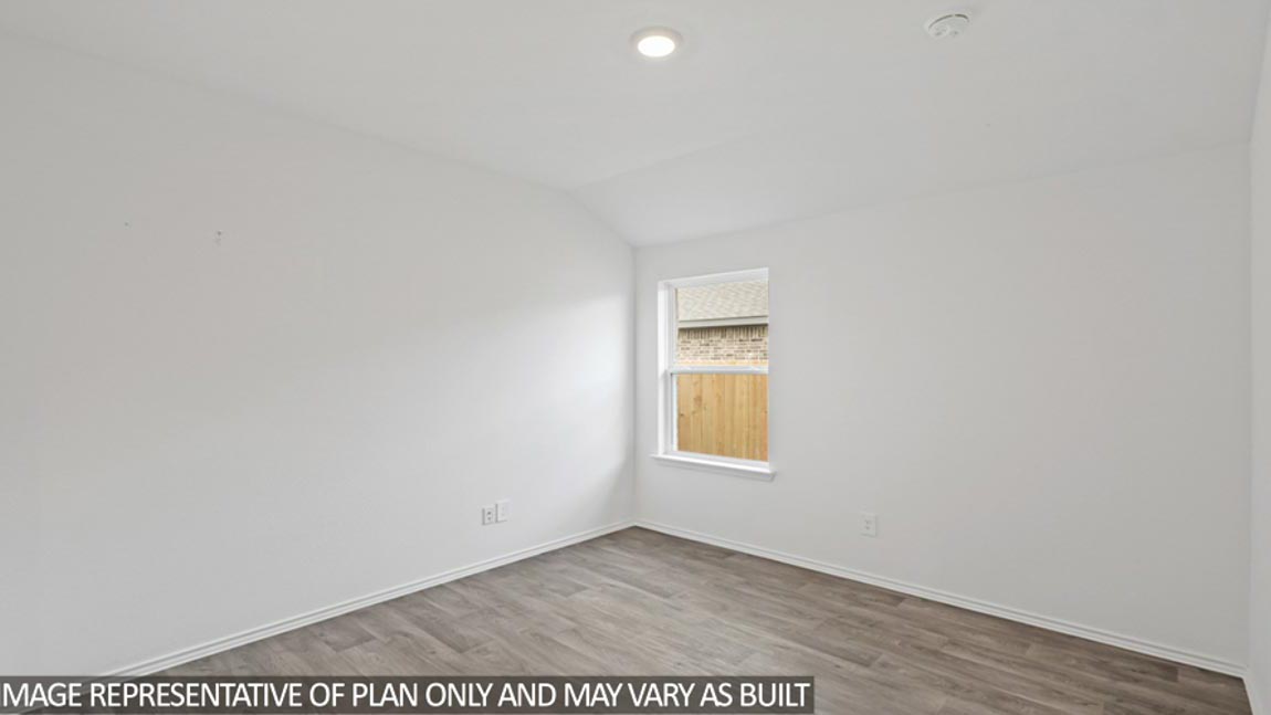 bedroom with carpet flooring and windows