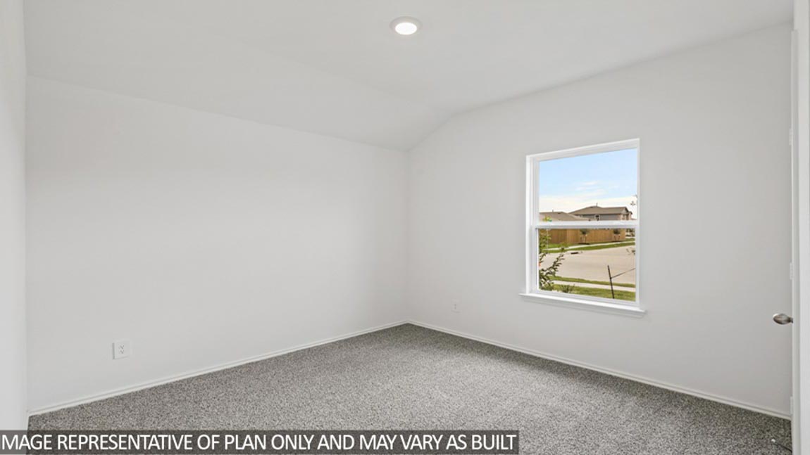 bedroom with carpet flooring and windows