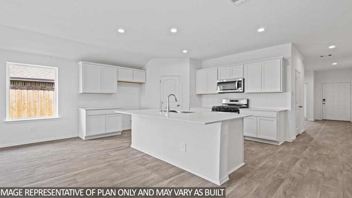 kitchen with quartz countertops, and stainless steel appliances in Brookshire, TX