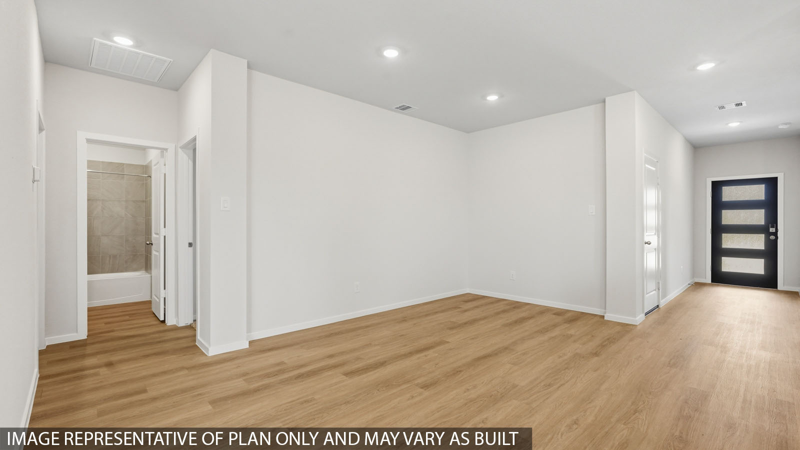 open concept living and dining area with vinyl flooring