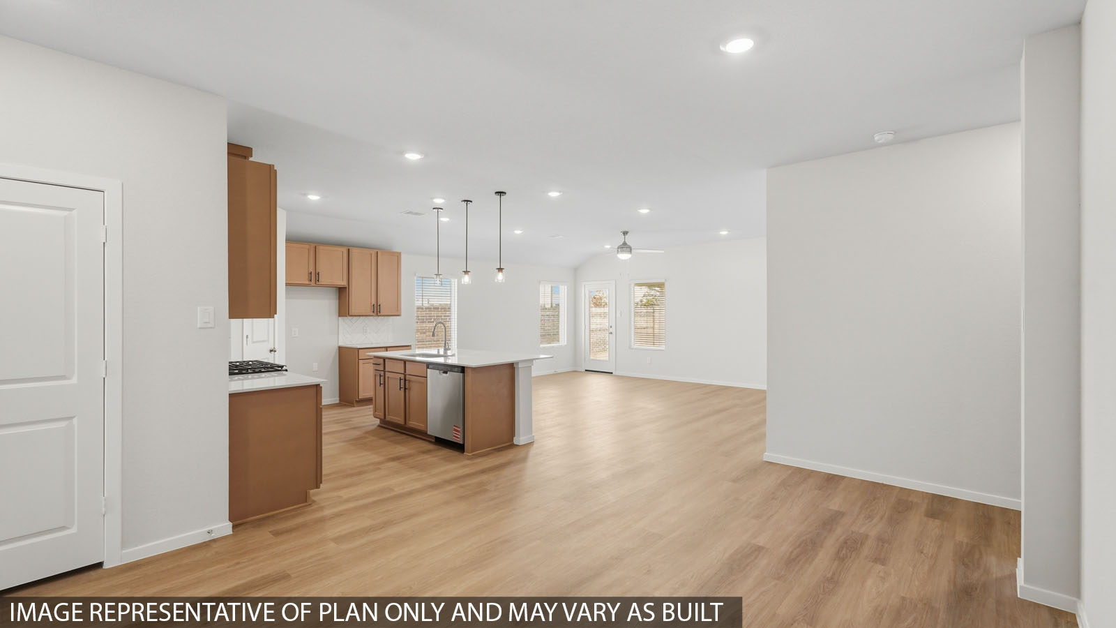 open concept living and dining area with vinyl flooring