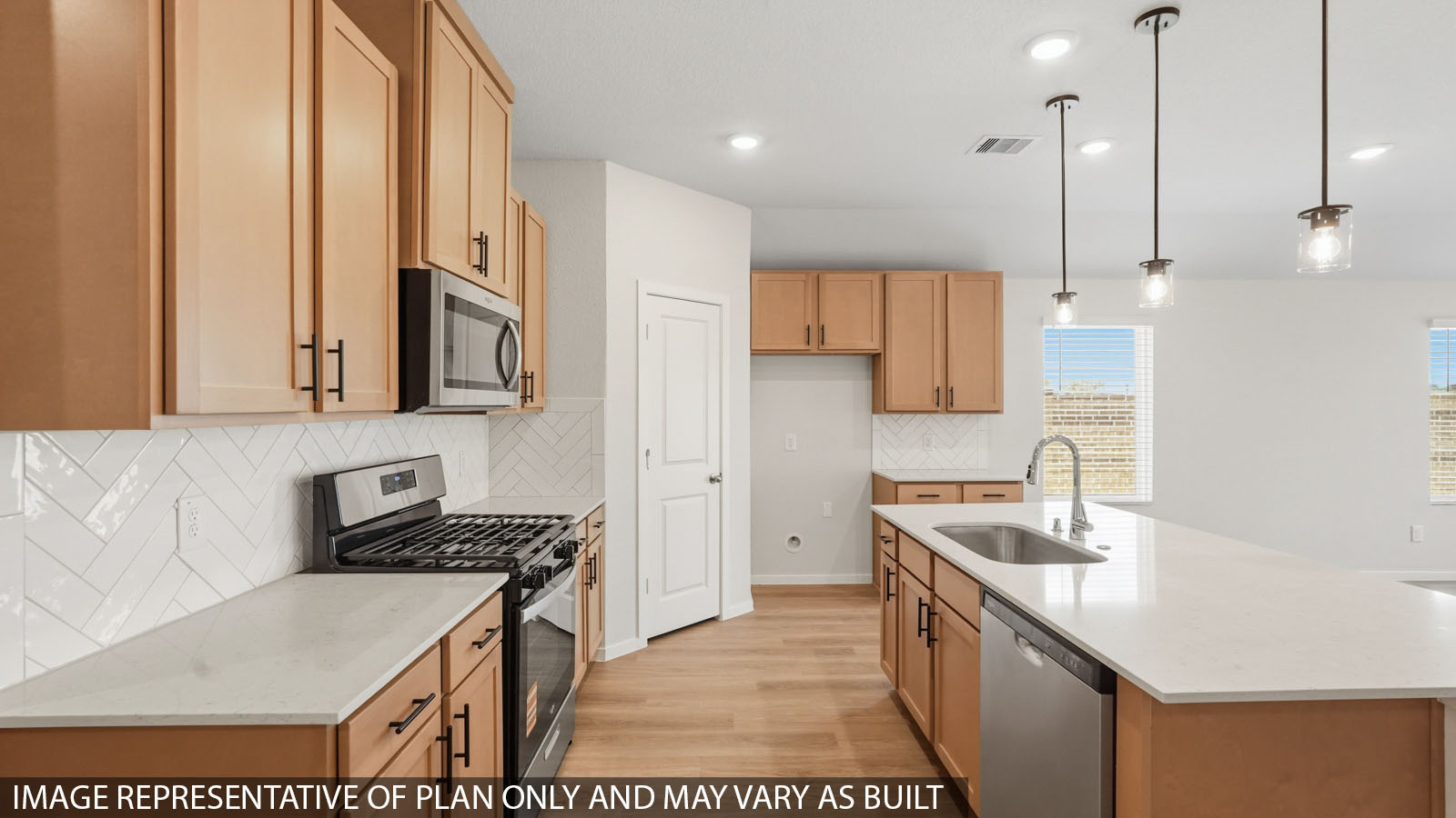 kitchen with backsplash, quartz countertops, and pendant lightings