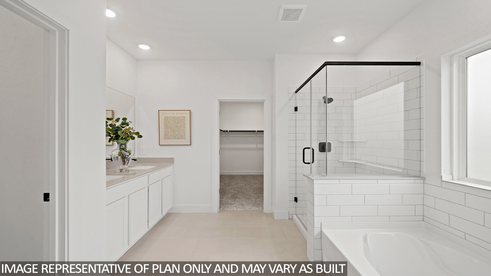 Primary bathroom with soaker tub and tile shower with semi frameless glass in Katy TX