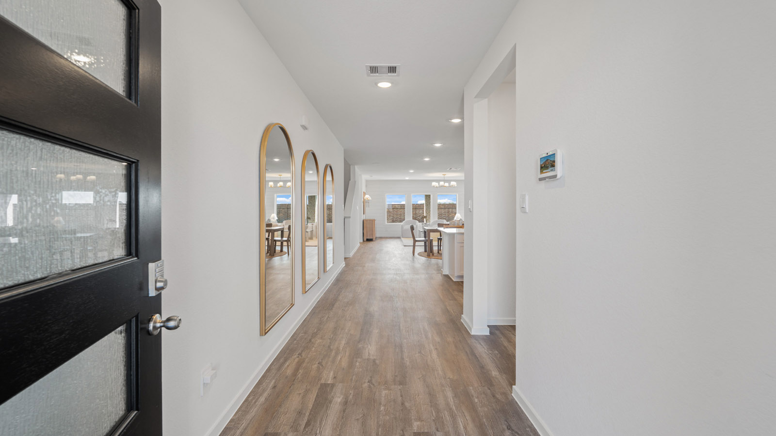 Entry hallway with vinyl flooring