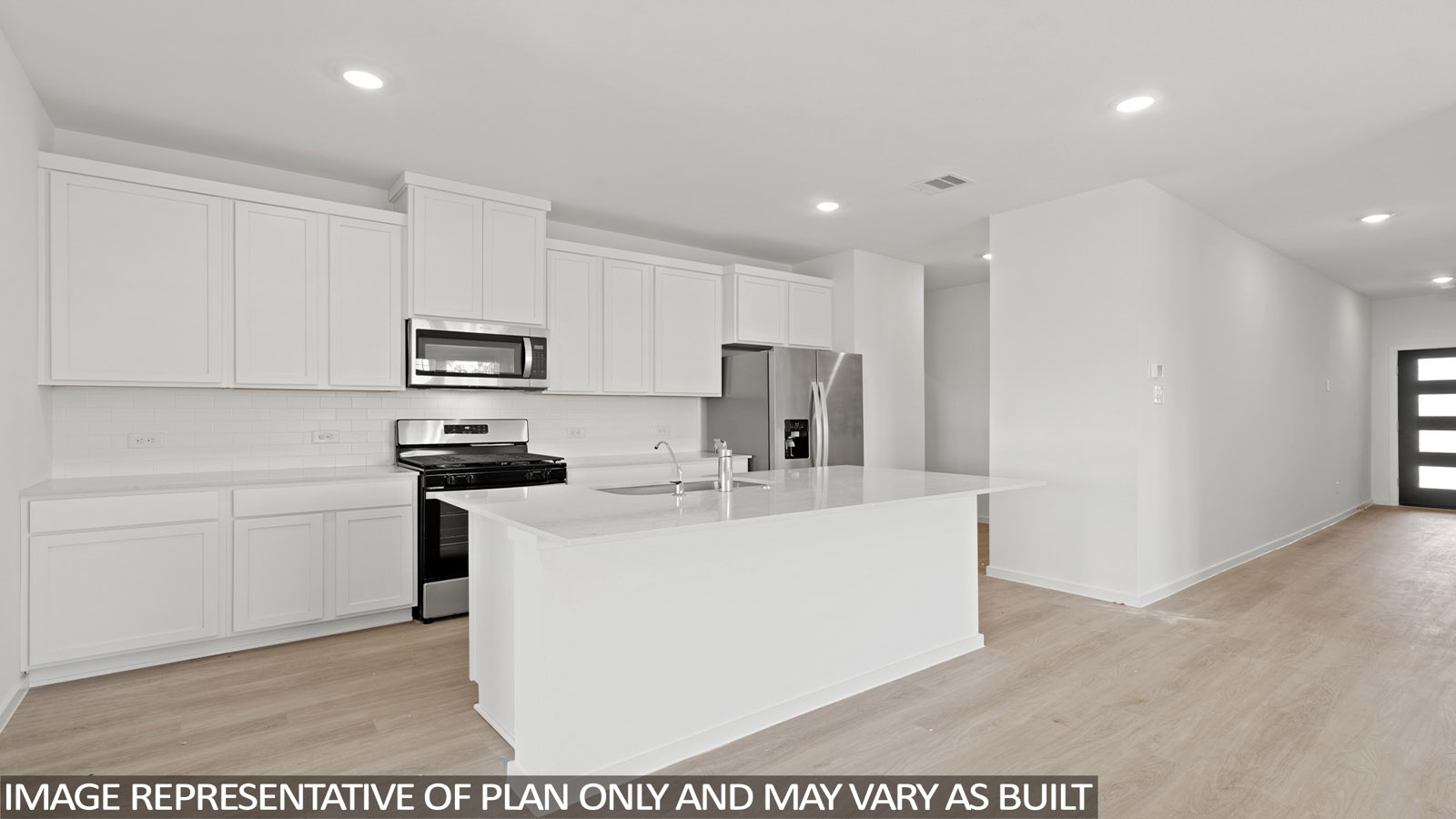 open concept livving and indining area with vinyl flooring, large windows, and quartz countertops