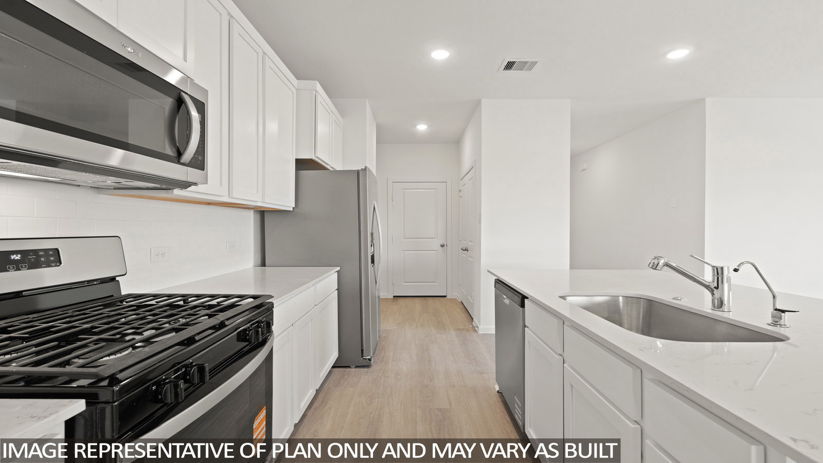 open concept livving and indining area with vinyl flooring, large windows, and quartz countertops