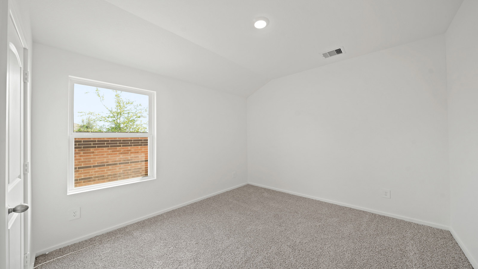 bedroom with carpet flooring and window