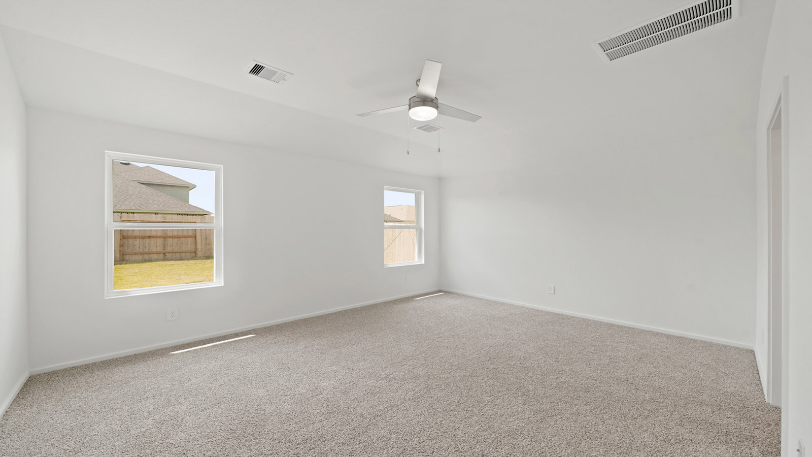 bedroom with carpet flooring and window