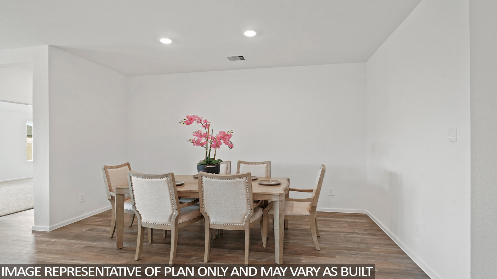open concept living and dining area with vinyl flooring