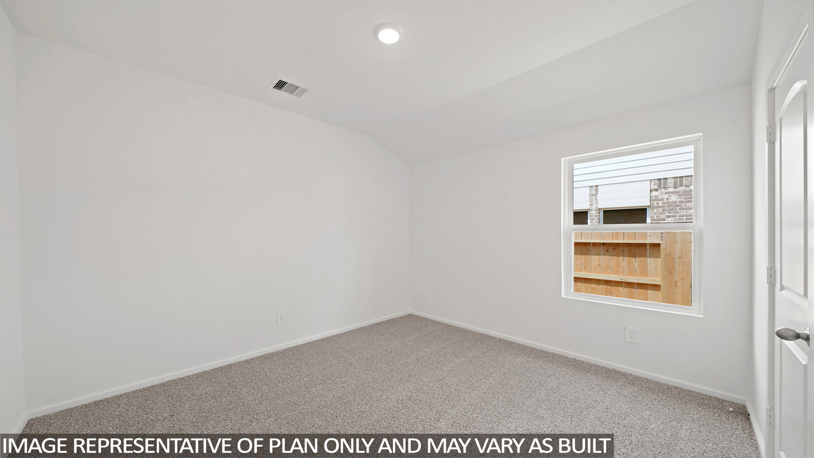 bedroom with carpet flooring and window
