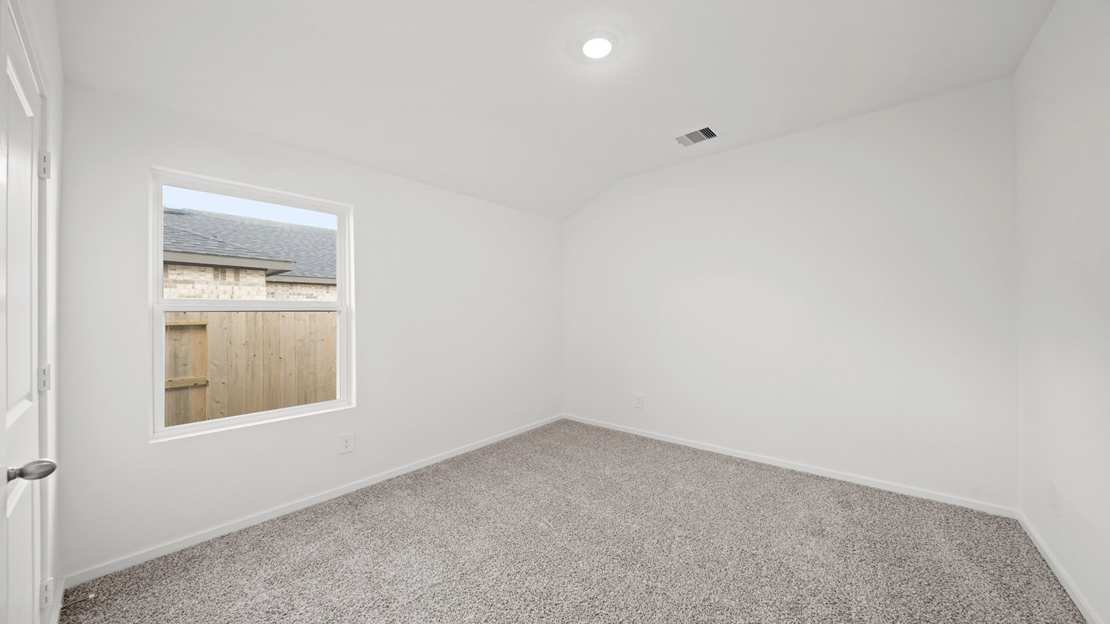 bedroom with carpet flooring and window