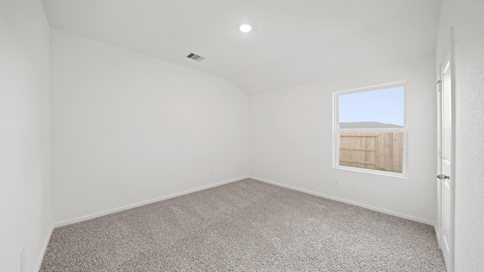 bedroom with carpet flooring and window