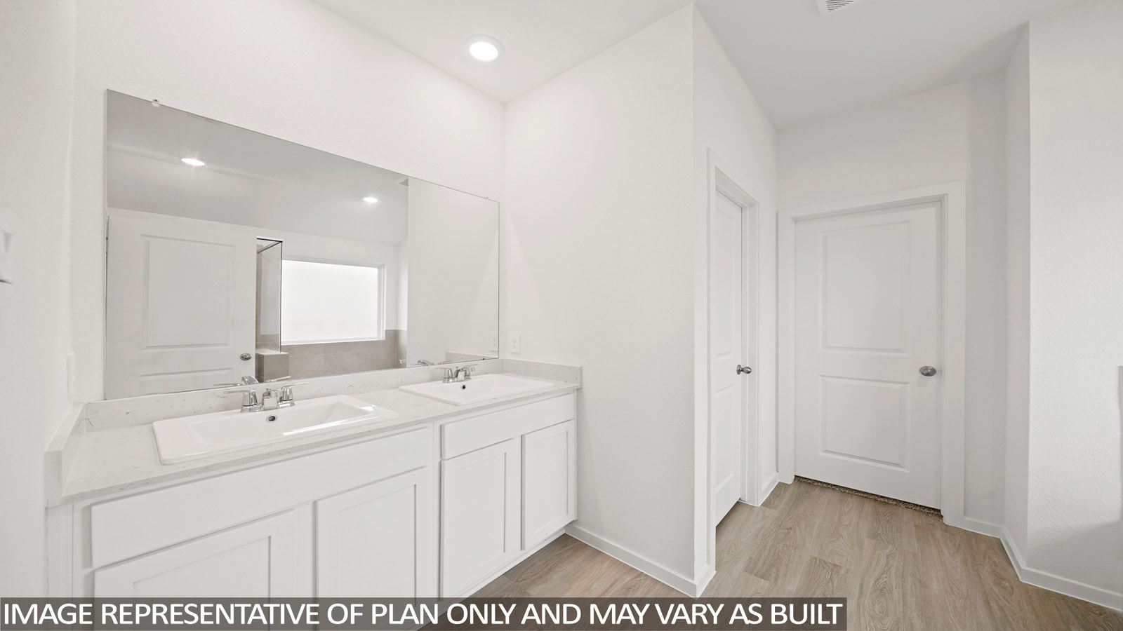 primary bathroom with separate tub and shower