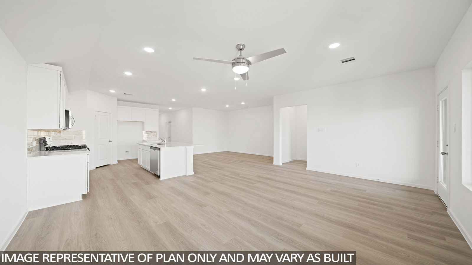open concept living and dining area with vinyl flooring and large windows