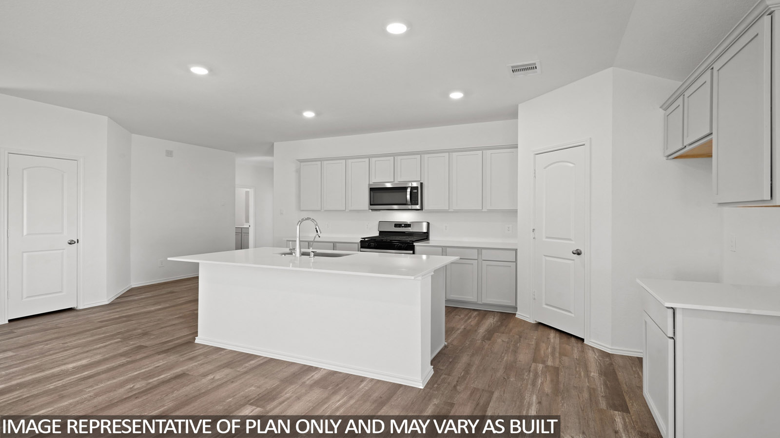kitchen with quartz countertops and stainless steel appliances