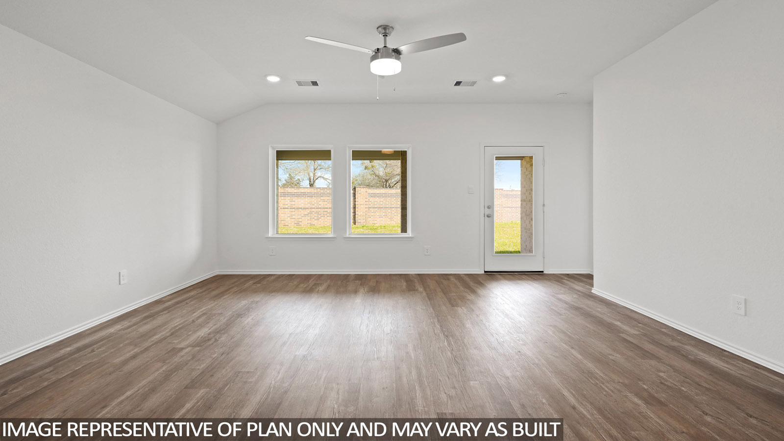 living and dining area with vinyl flooring