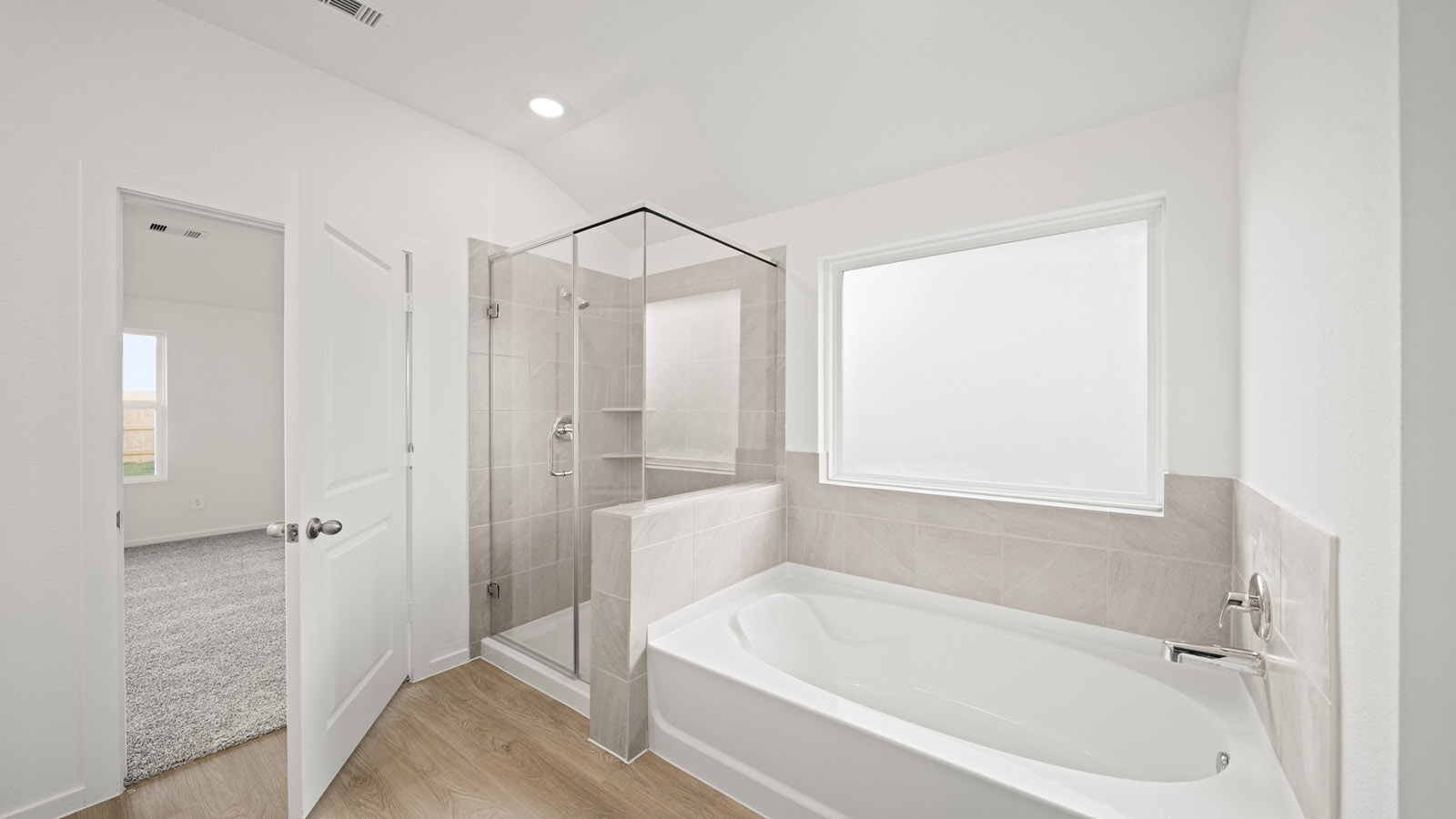 primary bathroom with seperate tub and shower