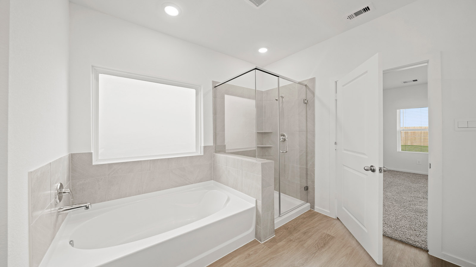 bathroom with seperate tub andshower