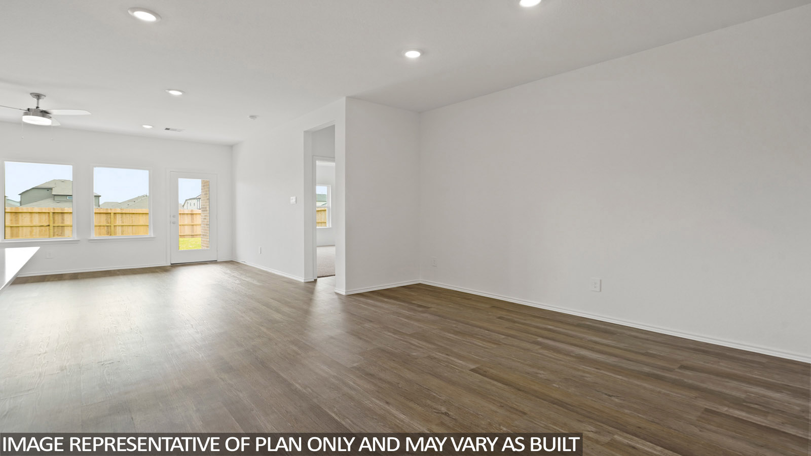 living room with vinyl flooring and large windows