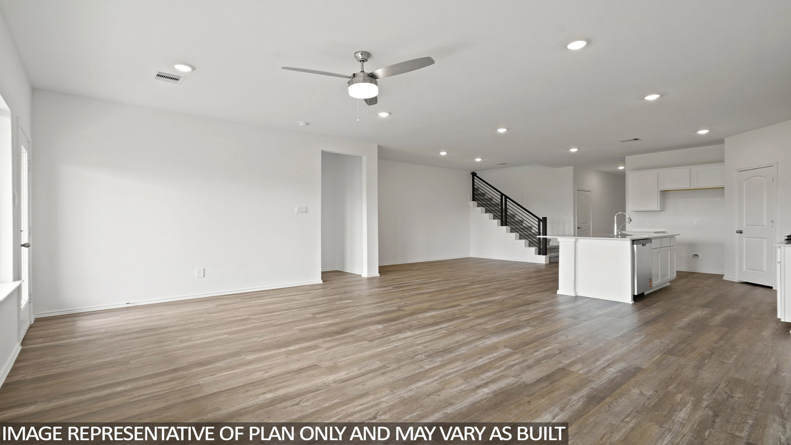 living room with vinyl flooring and large windows