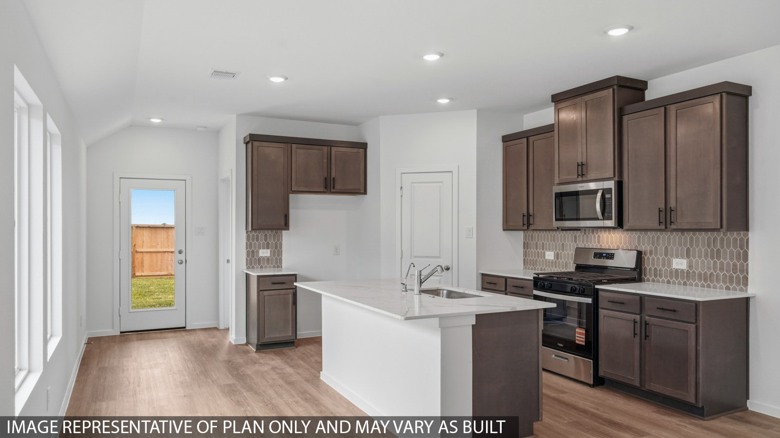 kitchen with quartz countertops and stainless steel appliances