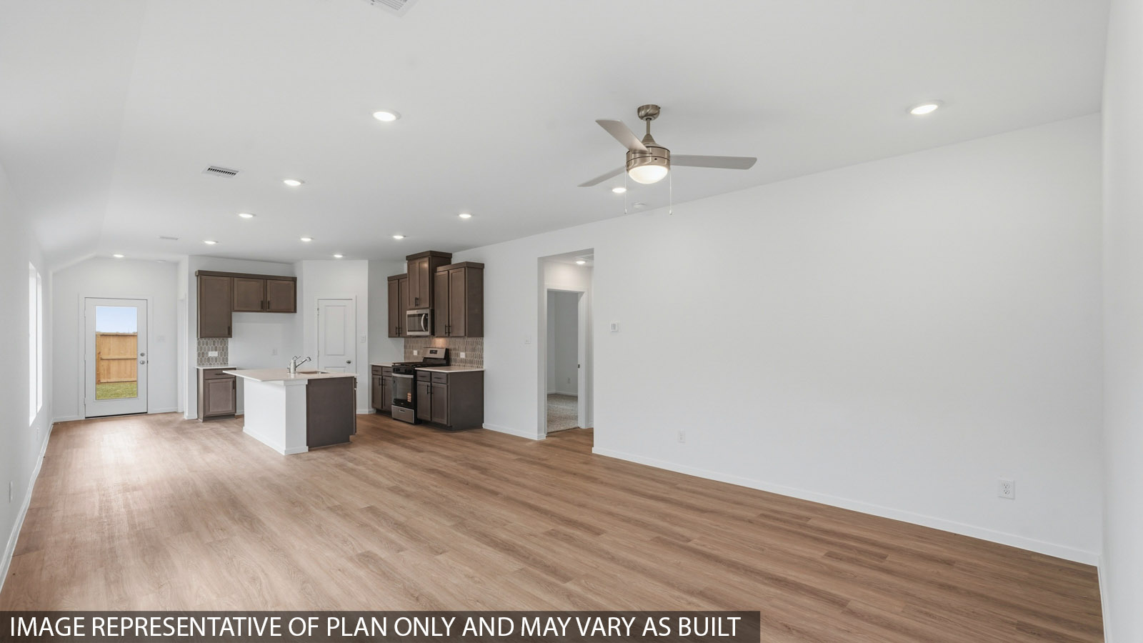 open concept living and dining area with vinyl flooring an large windows