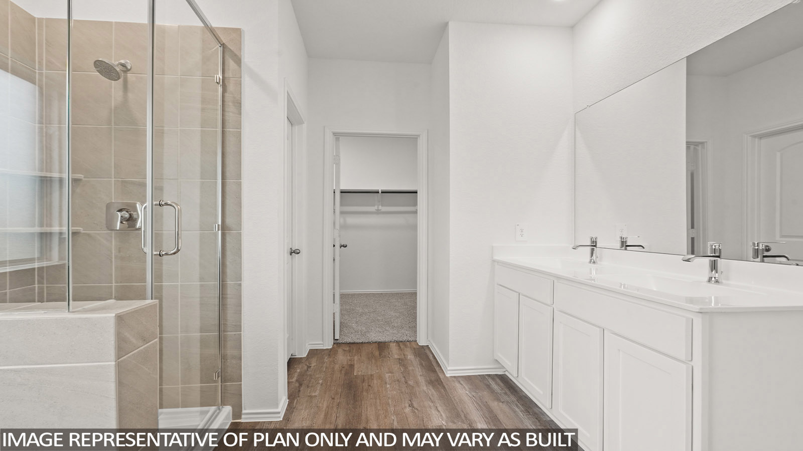 primary bathroom with separate tub and shower