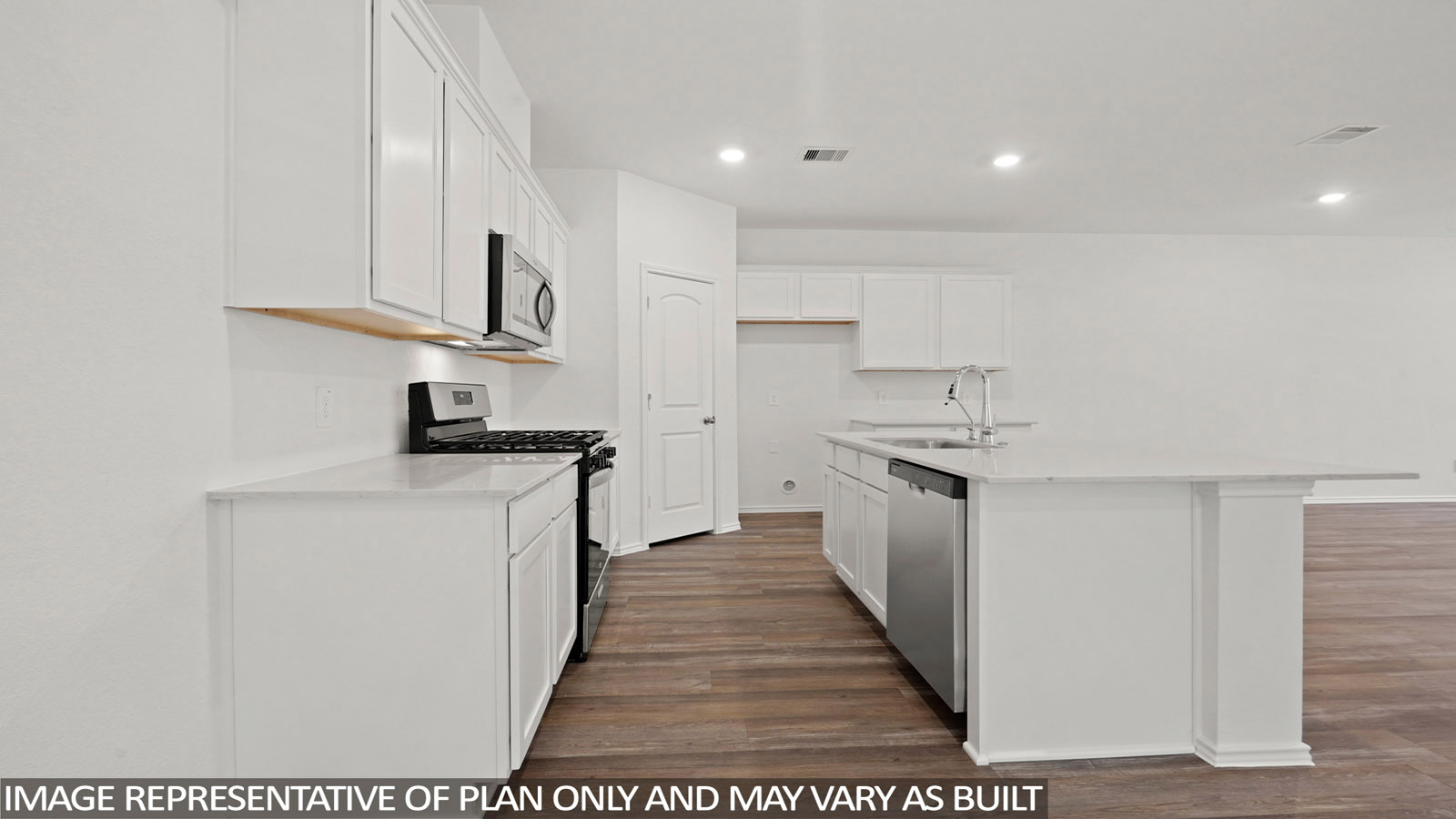 kitchen  th stainless steel appliances and quartz countertops