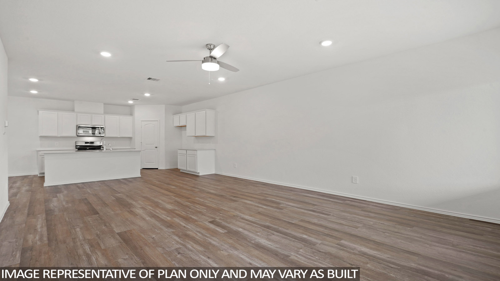 open concept living and dining area with vinyl flooring and large wwdo