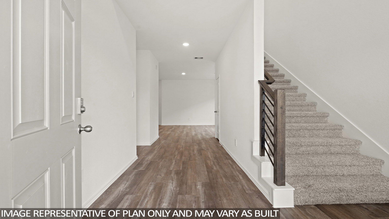 open concept living and dining area with vinyl flooring and large wwdo