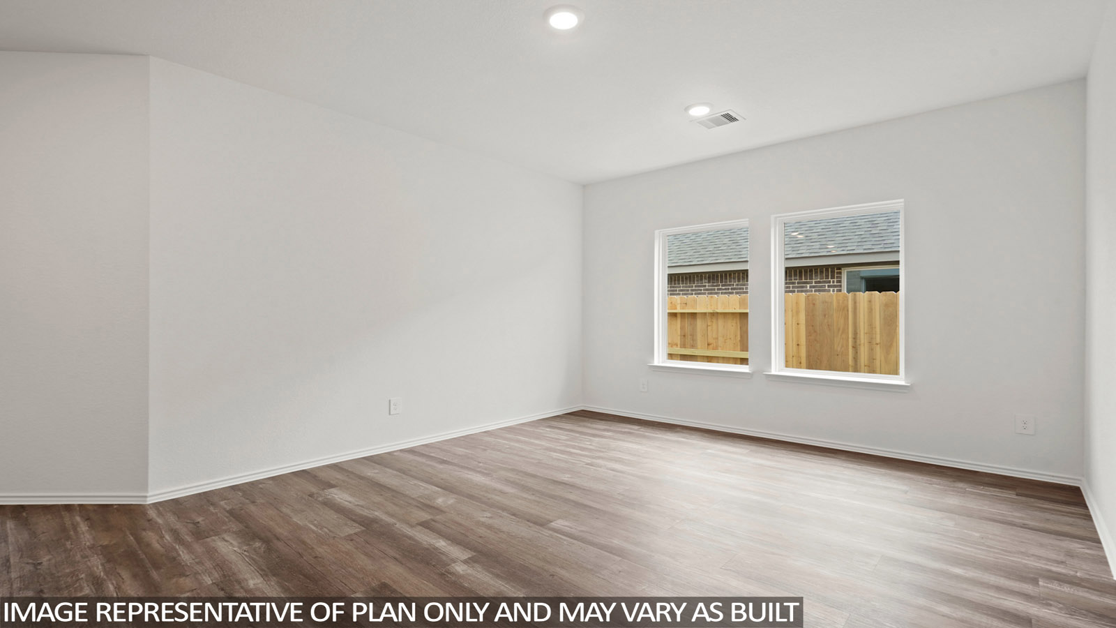 open concept living and dining area with vinyl flooring and large wwdo
