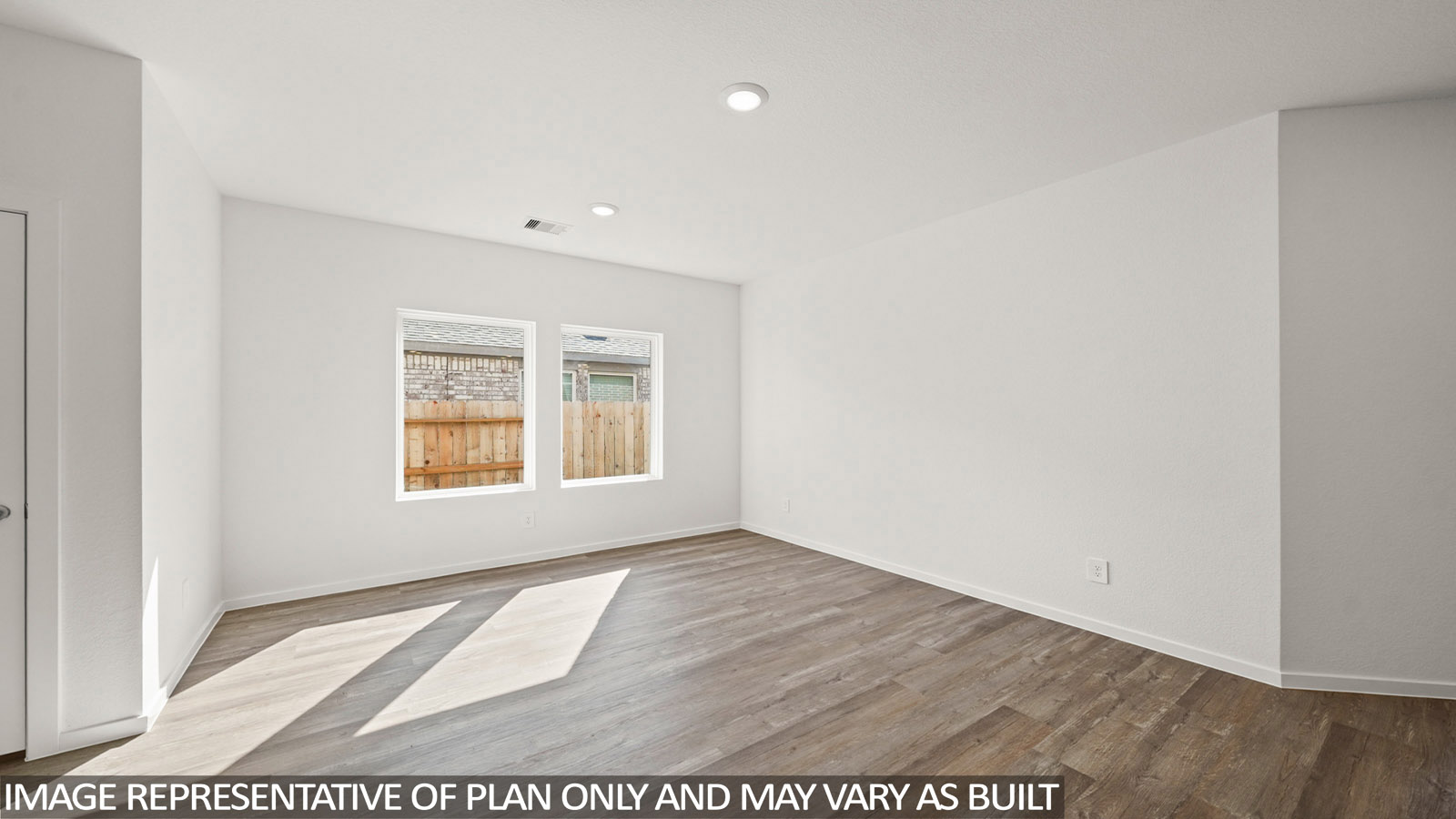 open concept living and dining area with vinyl flooring and large windows