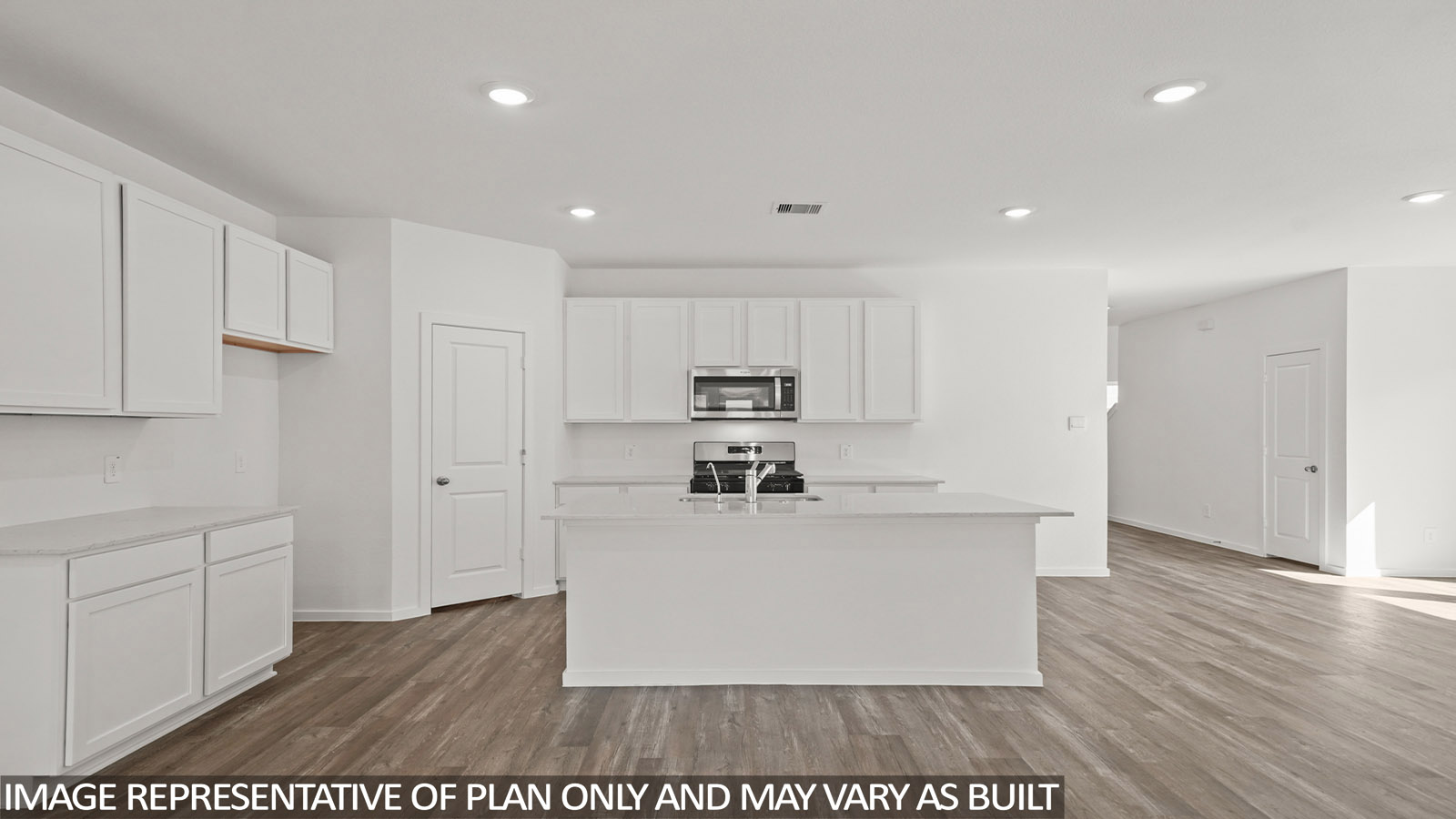 kitchen with quartz countertops and stainless steel appliances