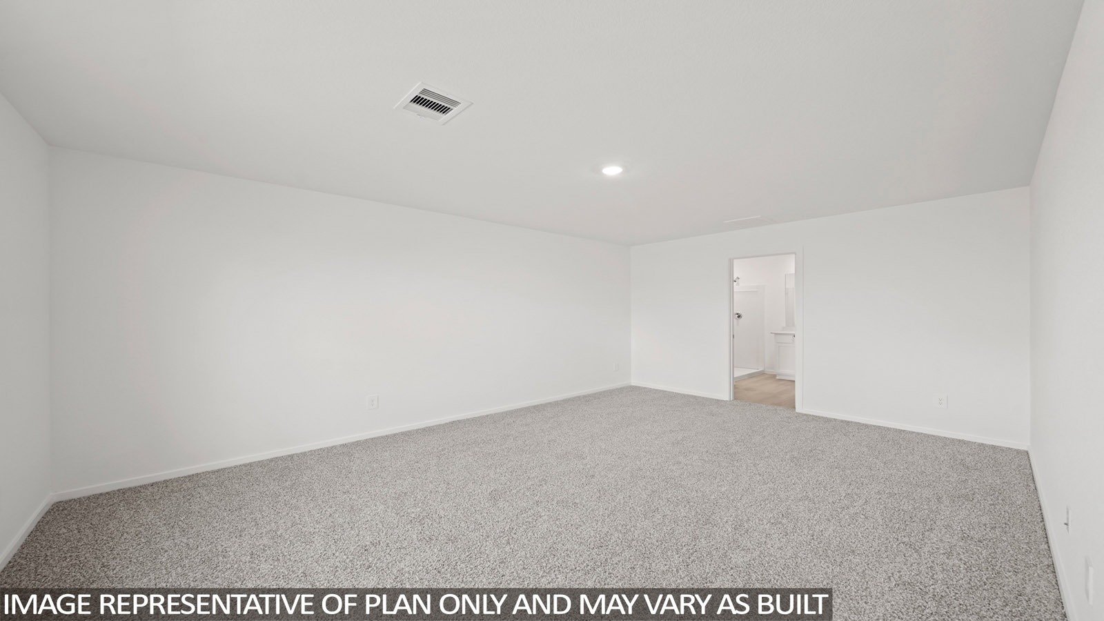 Primary bedroom with carpet flooring