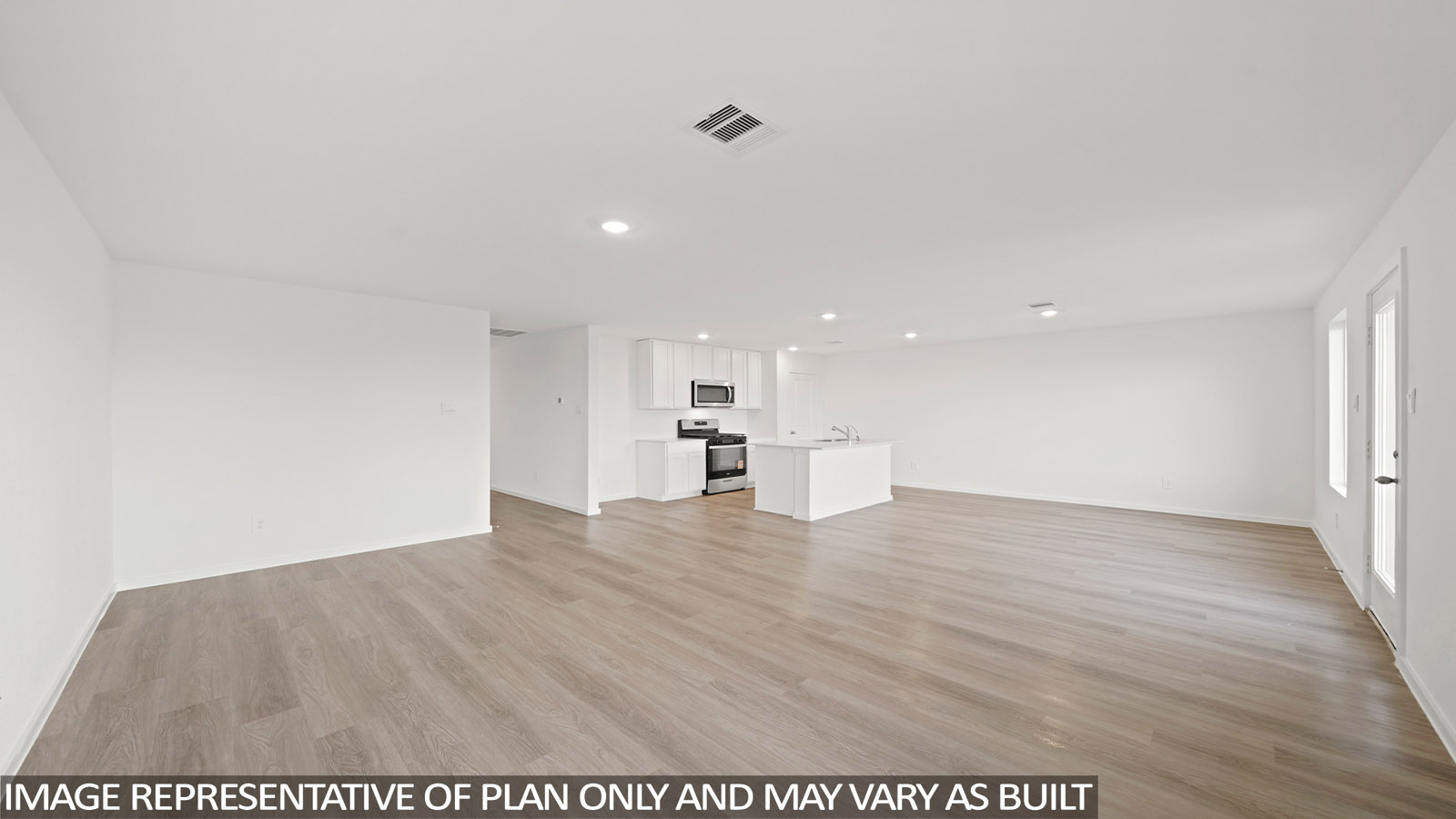 Open concept living, dining, and kitchen area