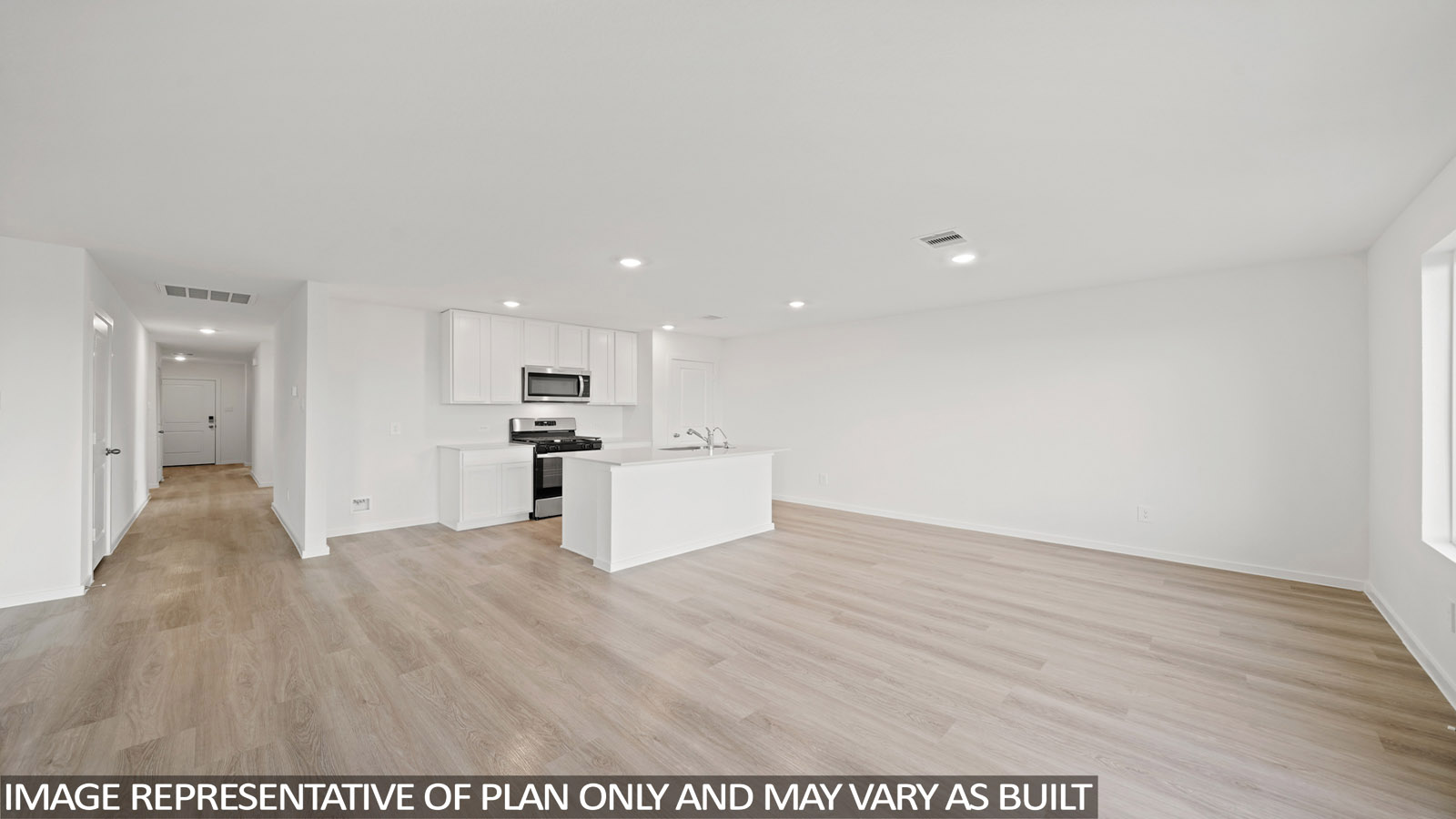 Open concept living, dining, and kitchen area