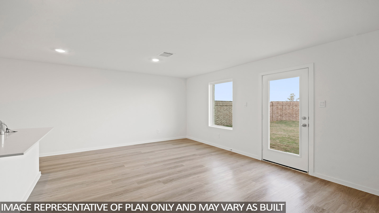 Open concept living, dining, and kitchen area