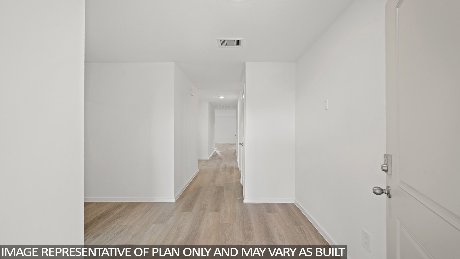 Entry hallway with vinyl flooring