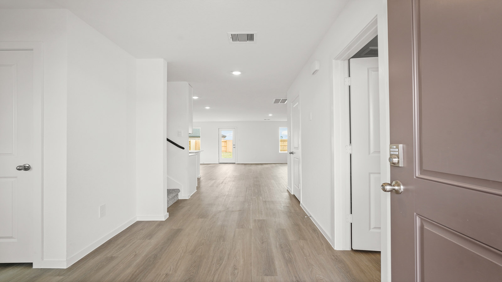 Entry hallway with vinyl flooring