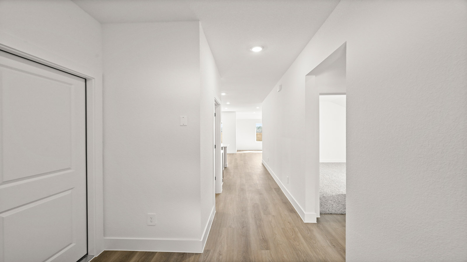 Entry hallway with vinyl flooring