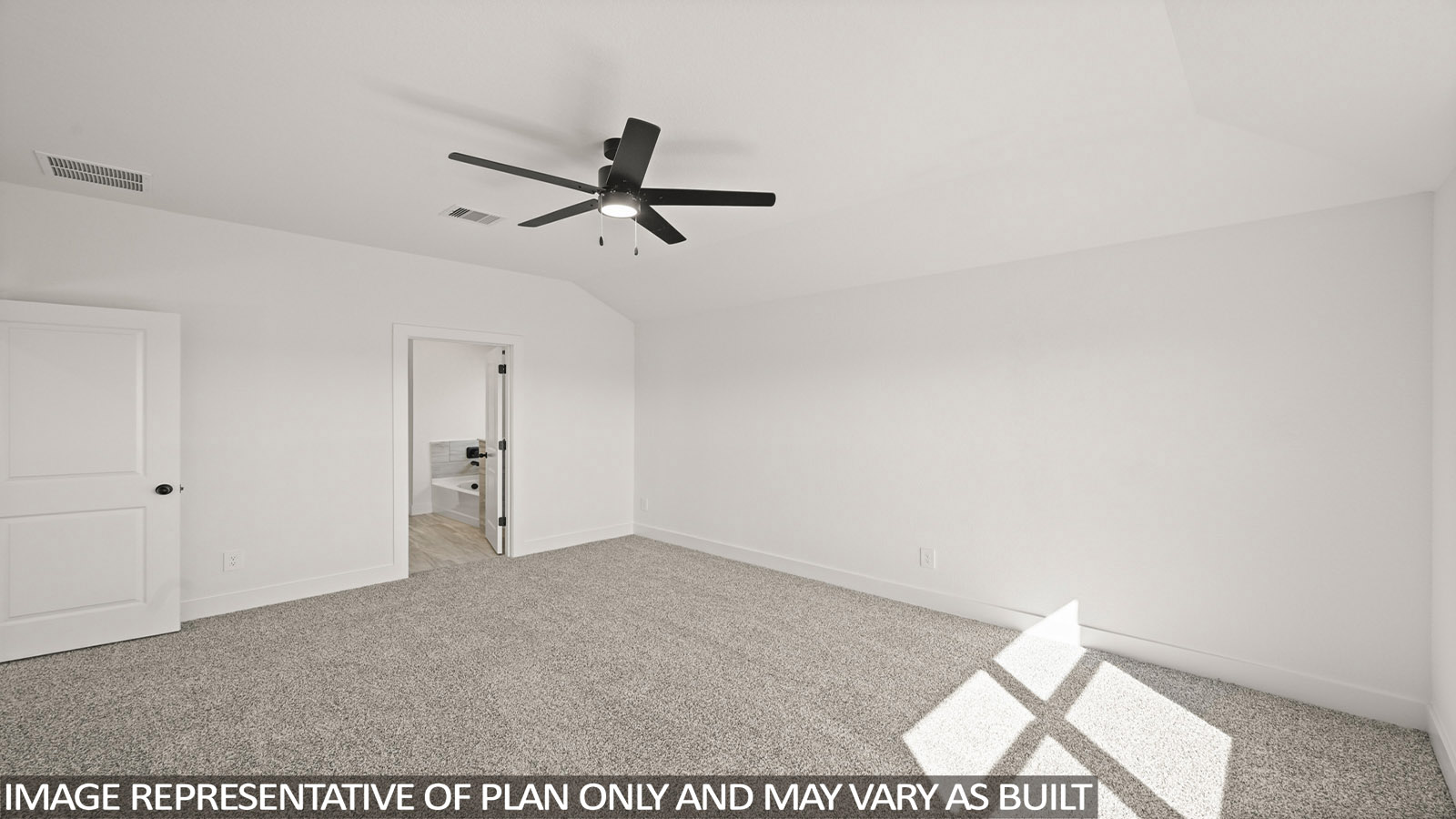Large Primary bedroom with shag carpet flooring and bright window