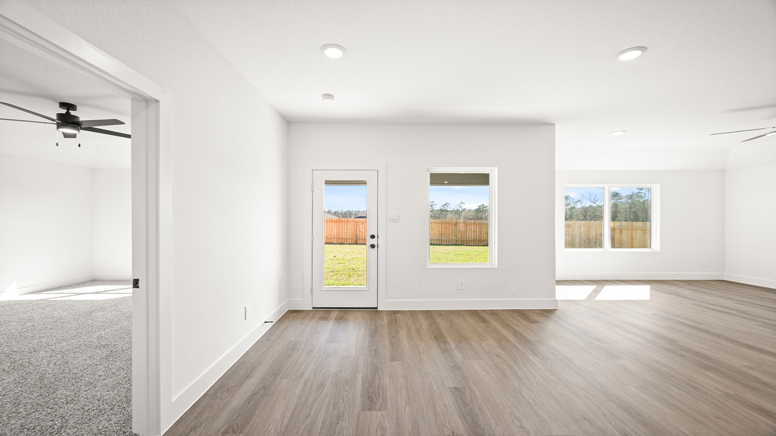 Open concept living, dining, and kitchen area