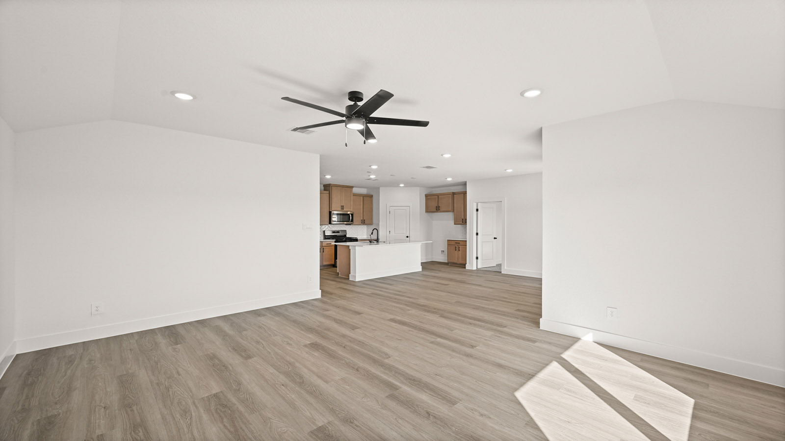 Open concept living, dining, and kitchen area