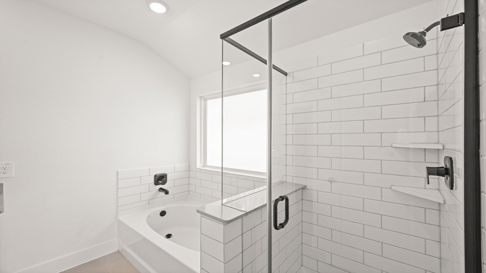 Primary bathroom with tub and shower
