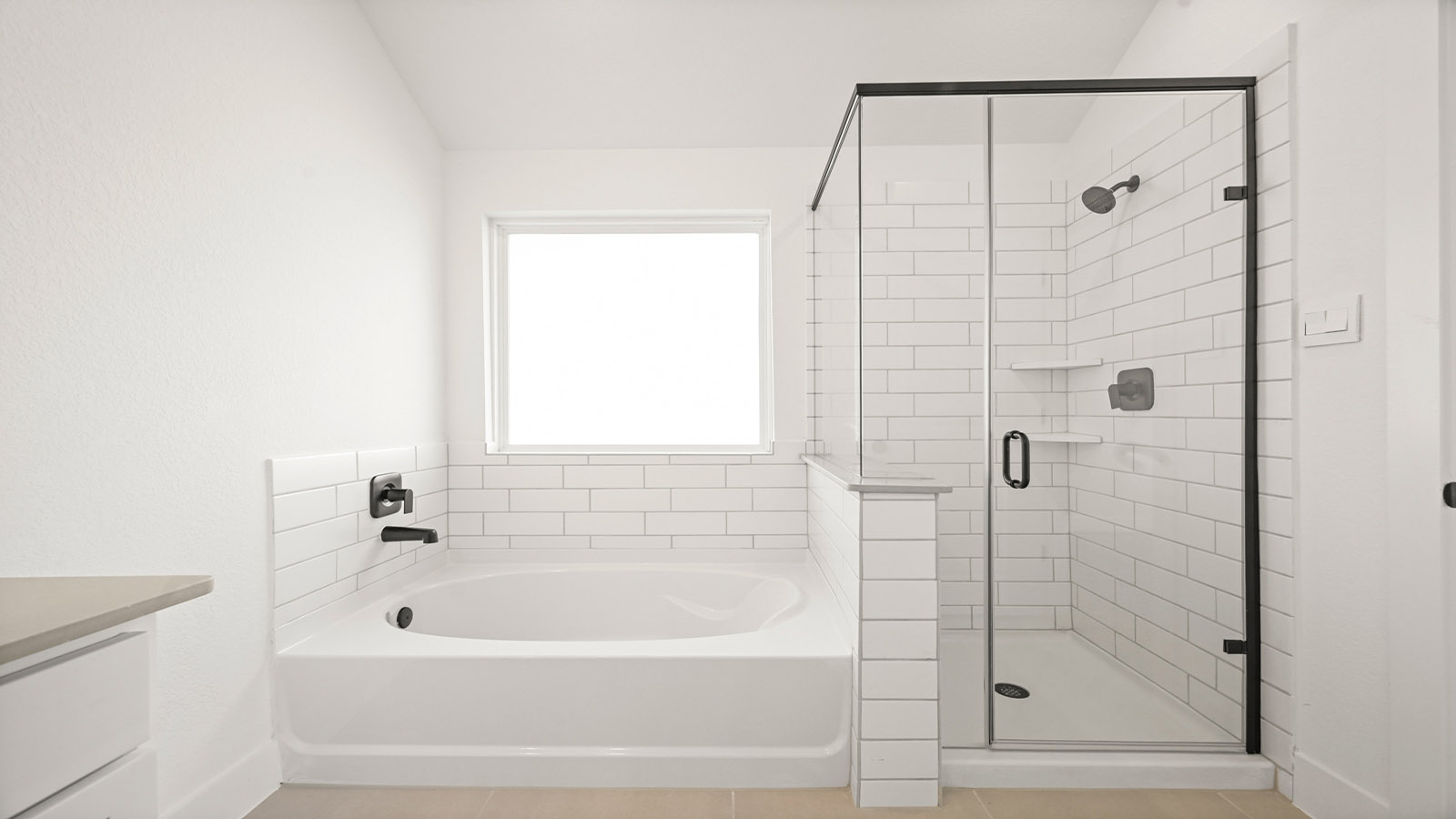 Primary bathroom with tub and shower