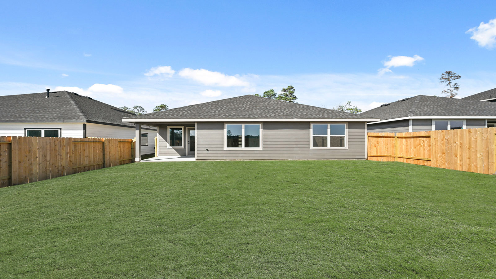 Back of house with cozy porch