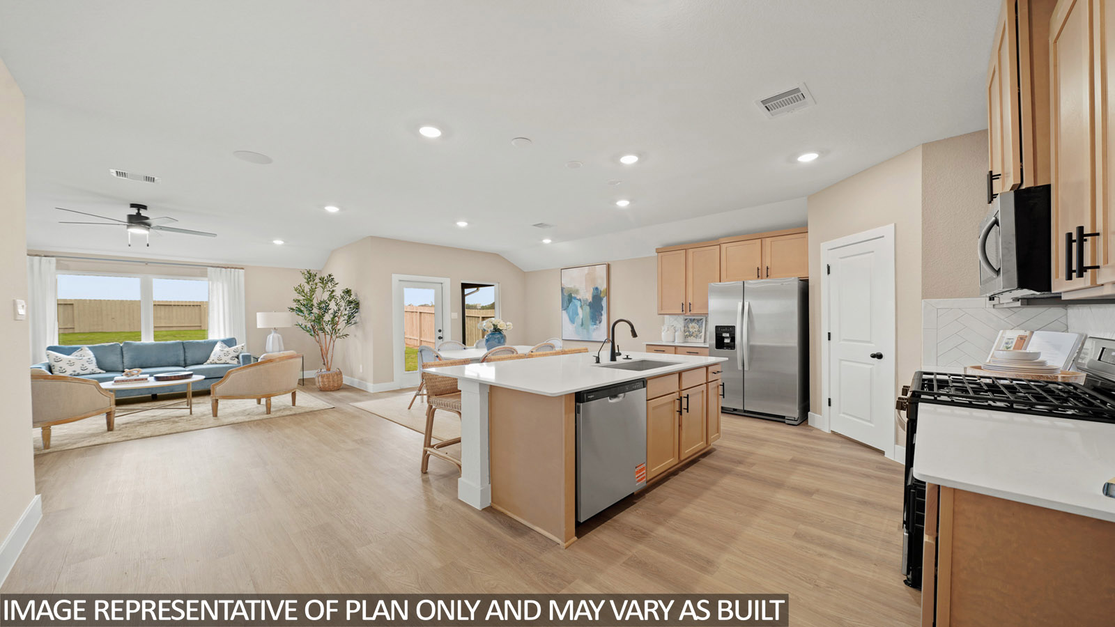 Kitchen with an island and vinyl floor