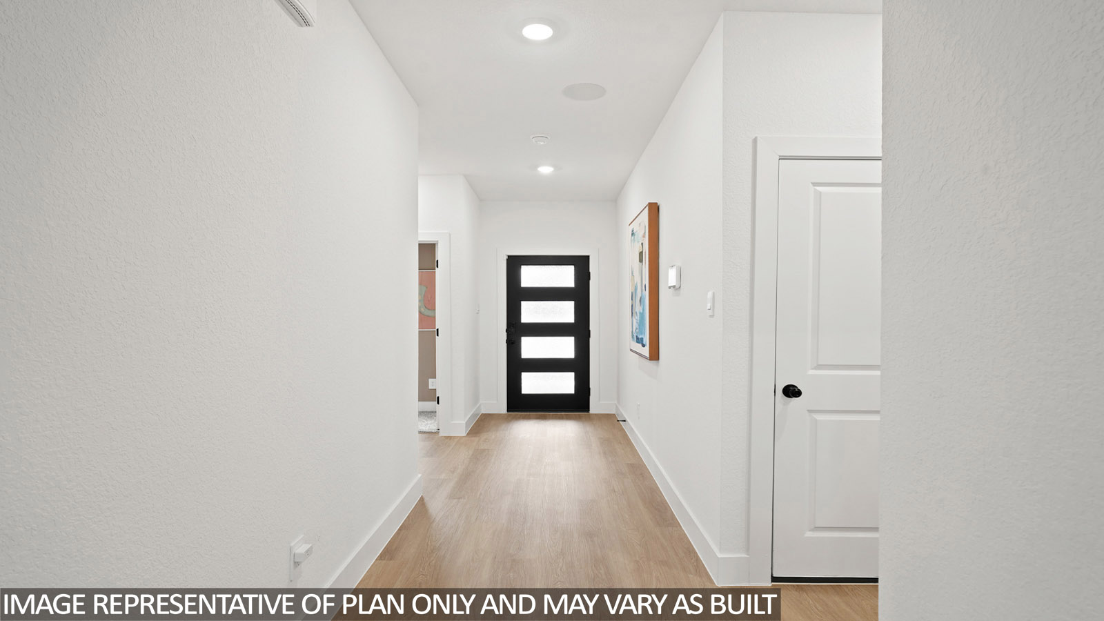 Entry hallway with vinyl flooring