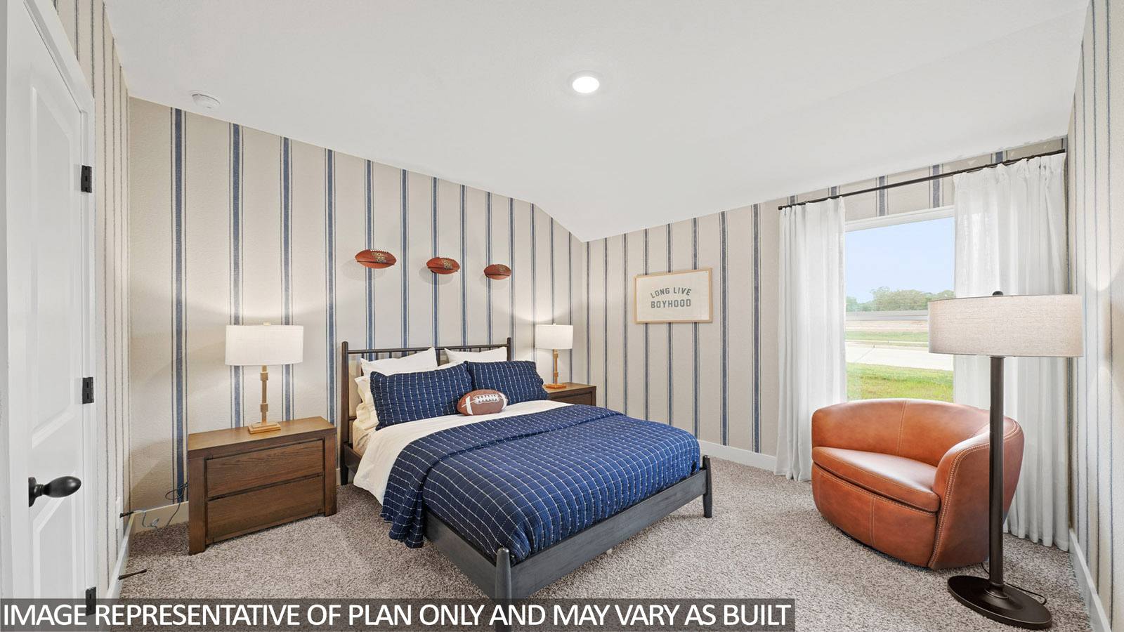 Secondary bedroom with carpet flooring