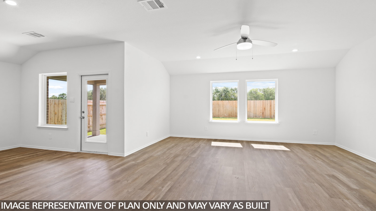 open concept living and ding area with large windows and vinyl flooring